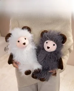 Close-up of soft white and grey plush goat dolls featuring premium long fluffy faux fur