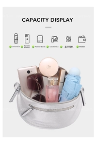 Silver crescent crossbody bag capacity display showing daily essentials storage detail
