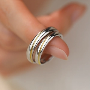 Minimalist S925 sterling silver couple ring with golden brushed texture on finger