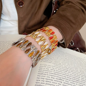 Retro enamel water drop elastic bracelets with sparkling rhinestones worn on wrist
