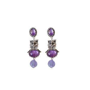 Vintage silver cat earrings with purple gemstones and beads in an elegant design