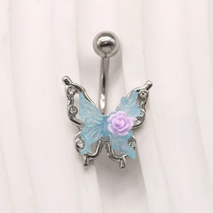 Detailed view of silver butterfly belly ring with blue wings and purple rose accents