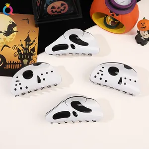 Detailed set of four Halloween claw clips featuring classic horror ghost face motifs