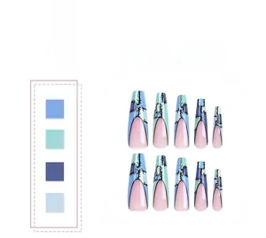 Detailed view of long coffin nails with blue and nude stitch pattern patchwork design