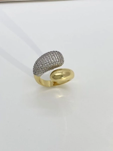 Detail of gold-plated open ring featuring a sparkling zircon-encrusted teardrop design