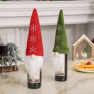 Christmas gnome wine bottle covers with knitted snowflake hats and white faux fur beards