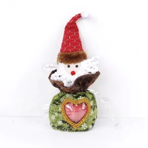 Santa Claus drawstring gift bag with heart-shaped window and green snowflake pattern