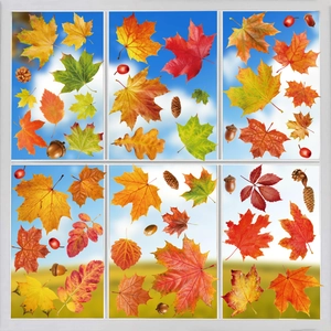 Autumn window clings set with maple leaves, acorns and pine cones on glass
