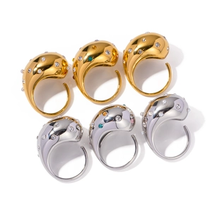 Exaggerated 18K gold and silver chunky teardrop rings with pearls and colorful gemstones