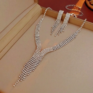 Luxury rhinestone teardrop tassel necklace and earrings set with waterfall drop design