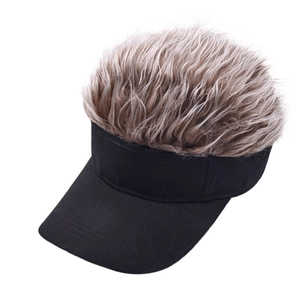 Detail of creative visor hat featuring synthetic brown wig hair on black cotton fabric