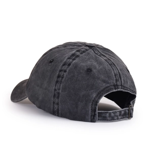 Close-up of vintage washed denim baseball cap with adjustable metal buckle and stitching