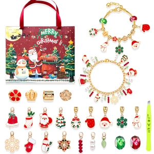 Christmas advent calendar set with two gold bracelets and 22 festive charms and beads