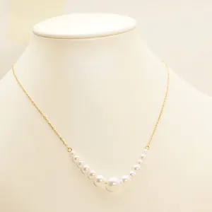 Elegant 18K gold-plated pearl necklace with 13 gradient white pearls on neck model