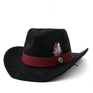 Detail of a western wool fedora featuring a red ribbon band, feather and vintage badge