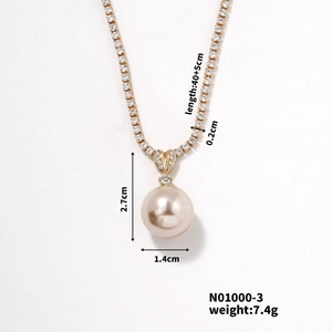 Detail view of pearl pendant necklace showing precise measurements and gold rhinestone chain