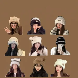 Collection of women's plush winter bear ear hats and thick knit caps in multiple colors