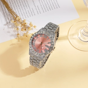 Detail of silver iced-out ladies watch with pink sunray dial and Roman numerals