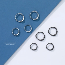 Detail of S925 silver bamboo hoop earrings in silver and black with size comparison