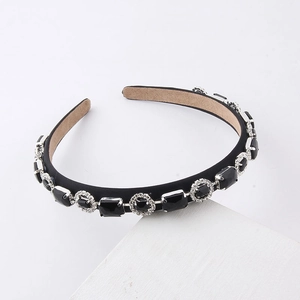 Fashion minimalist black headband with sparkling rhinestones for women on display