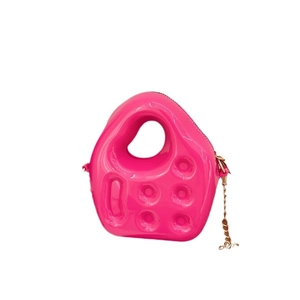 Sweet pink PVC jelly handbag for kids with metallic gold chain and circular textures