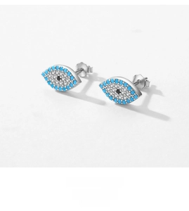 Detailed close-up of s925 silver evil eye stud earrings with blue and white zircon stones