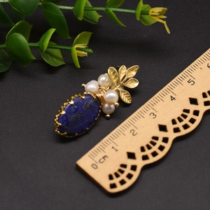 Lapis lazuli and natural pearl earring with branch design and measurement scale