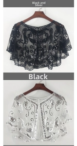 Detailed view of sequins embroidery on lightweight mesh cape with paisley patterns