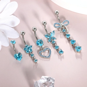 Set of 5 stainless steel belly rings with light blue zircon heart and flower designs