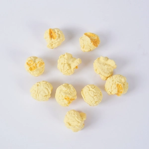 Realistic PVC spherical popcorn models with detailed yellow texture on white background