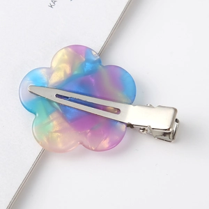 Floral acetate hair clip with iridescent blue and purple gradient finish for women