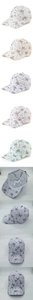 Detail of lace baseball cap with butterfly rhinestones and metal star studs on mesh
