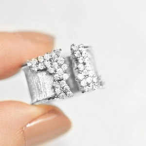 Wide brushed gold ring with sparkling zircon cluster for weddings and parties
