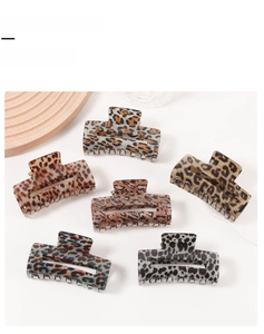 Set of six medium large leopard print hair claw clips with glitter finish for women