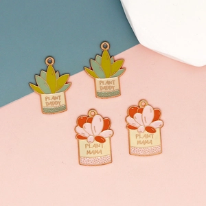 Enamel plant charms with Plant Daddy and Plant Mama text in colorful succulent pots
