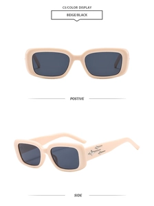 Macro view of beige square sunglasses featuring silver star details on the side temple