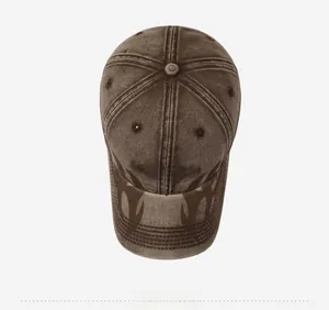 Close-up of brown washed vintage baseball cap with LA&DH embroidery and flame pattern