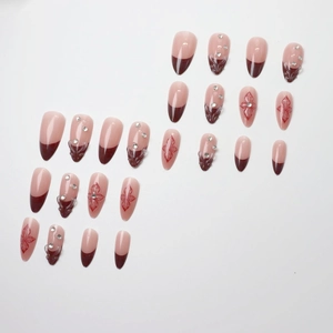 French almond fake nails in wine red and nude pink with rhinestones and floral art