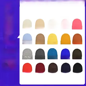 Detail of multi-color beanie hats with MAMA chenille letter patches and knit texture