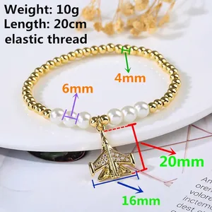 Elastic gold bead and pearl bracelet with a micro-pave airplane charm for hip-hop style