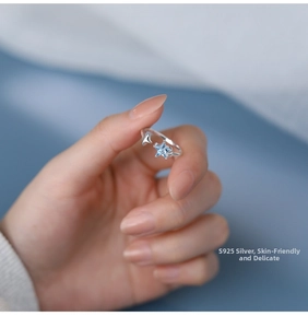 Macro shot of S925 sterling silver ring with light blue star shaped zircon stone