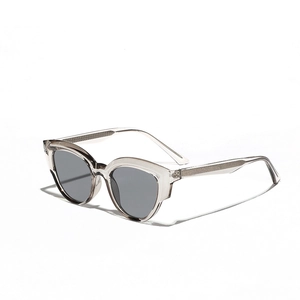 Retro cat-eye sunglasses with transparent grey TR90 frames and dark grey shaded lenses