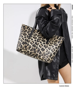 Detail view of the large leopard print tote bag showing its spacious design and stylish texture