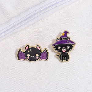Halloween enamel pin set featuring cute black cat in wizard hat and purple wing bat