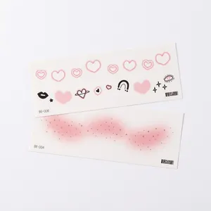 Cute heart shaped New Year face tattoo stickers with pink blush and rainbow designs