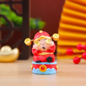 Detail of Q-style Fortune God resin figure with golden coins and spring head on drum base