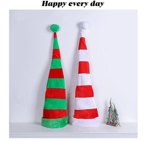 Macro detail of long striped plush elf hats in red, green and white festive colors