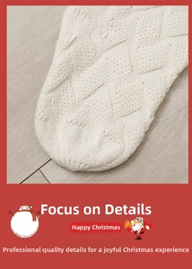 Detailed close-up of ivory cable knit Christmas stocking with thick wool texture