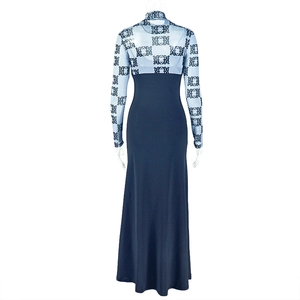 Detailed back view of a slim-fit blue patchwork dress with stand collar and mesh sleeves