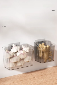 Wall-mounted storage basket for ginger and garlic with vertical stripe design